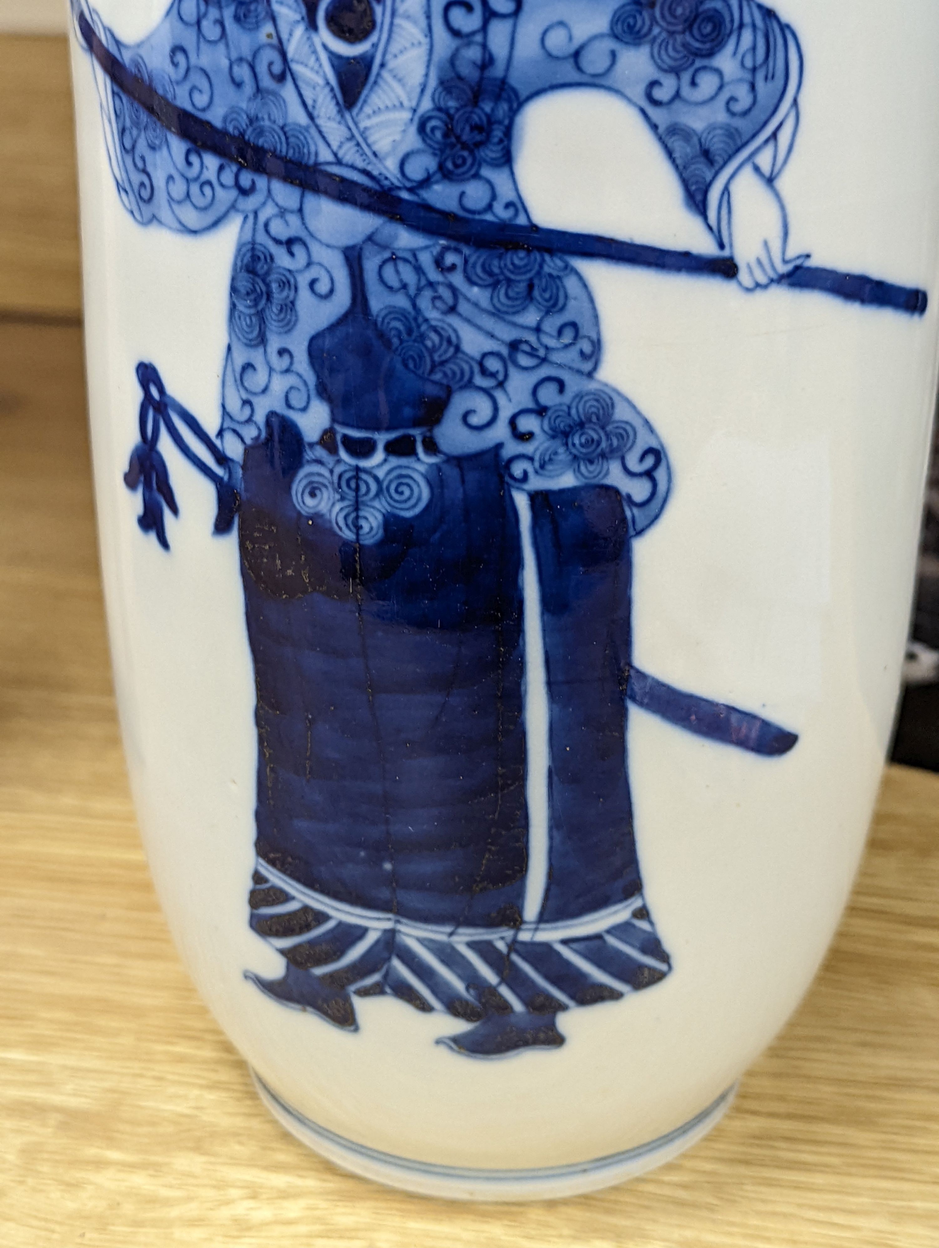 A Chinese blue and white rouleau vase, 35 cms.